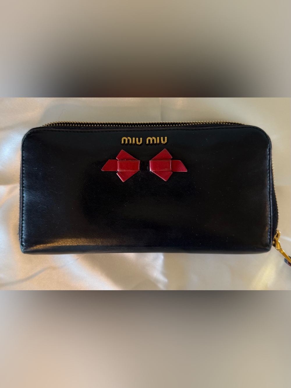 Miu Miu Black Leather Zip Wallet with Red Bow Detail